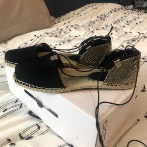 Black and gold espadrilles